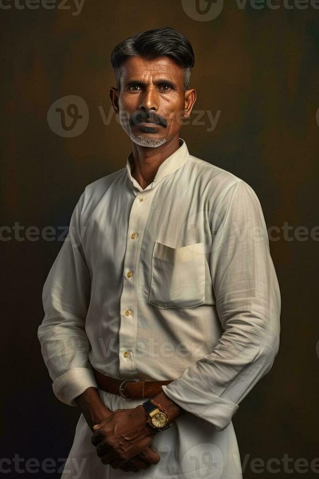 AI generated a man dressed in a white shirt and brown dress pants, standing in front of a brown background. He appears to be well-dressed and is the main subject of the photo. photo