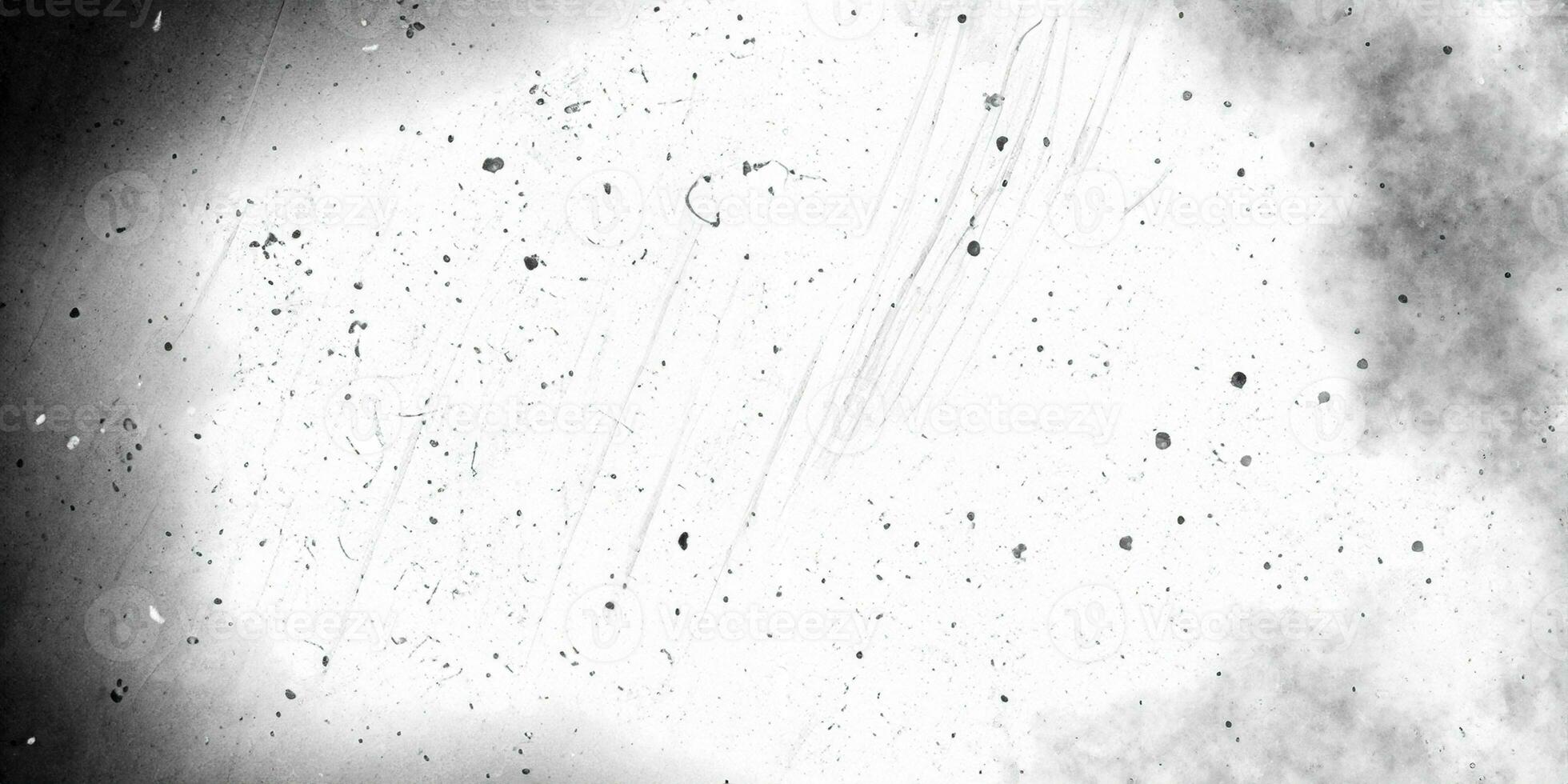 Dirty monochrome overlay screen effect use for grunge background and vintage style. Abstract dust particle and dust grain texture with white center and black borders photo