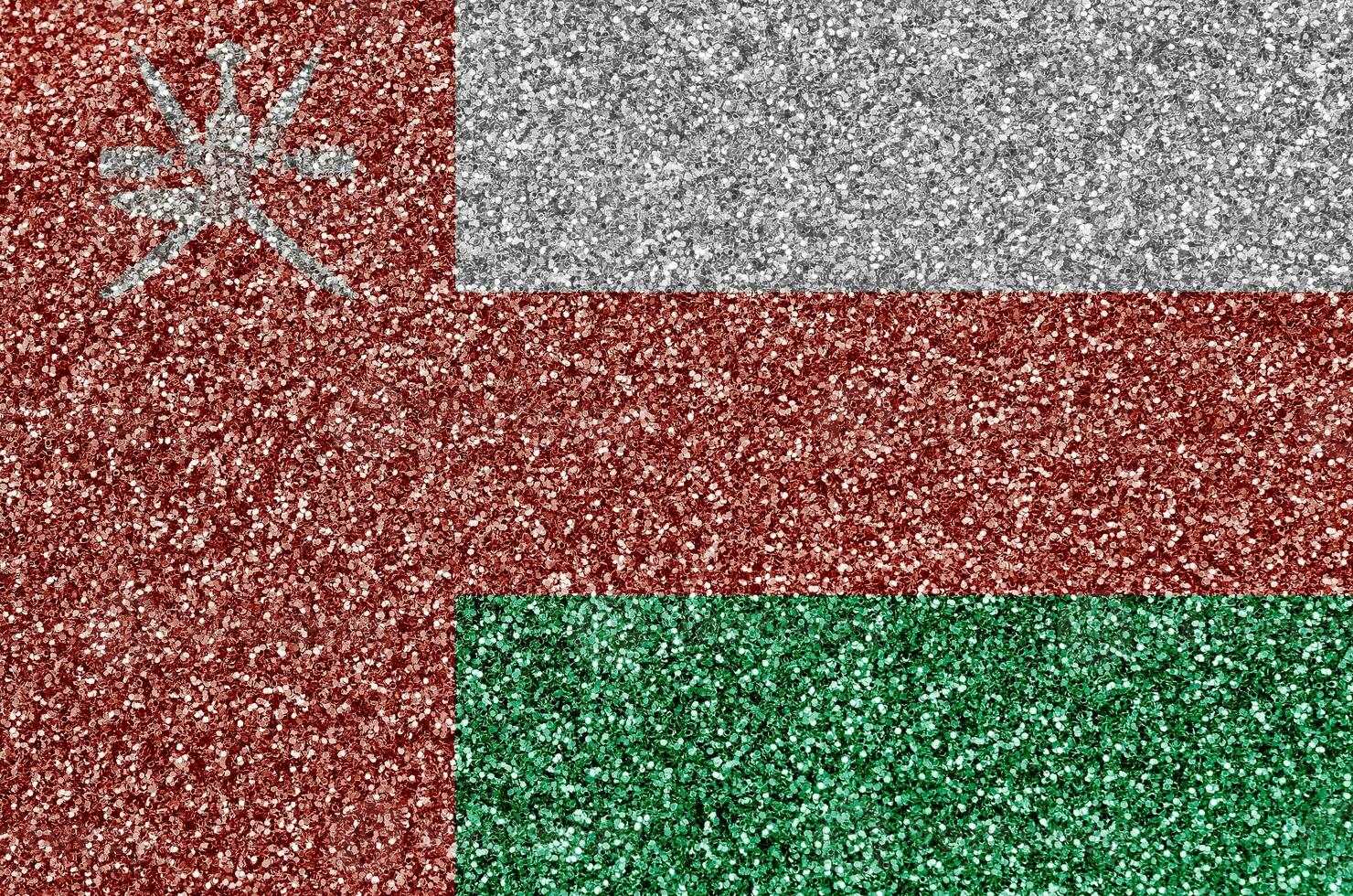 Oman flag depicted on many small shiny sequins. Colorful festival background for party photo