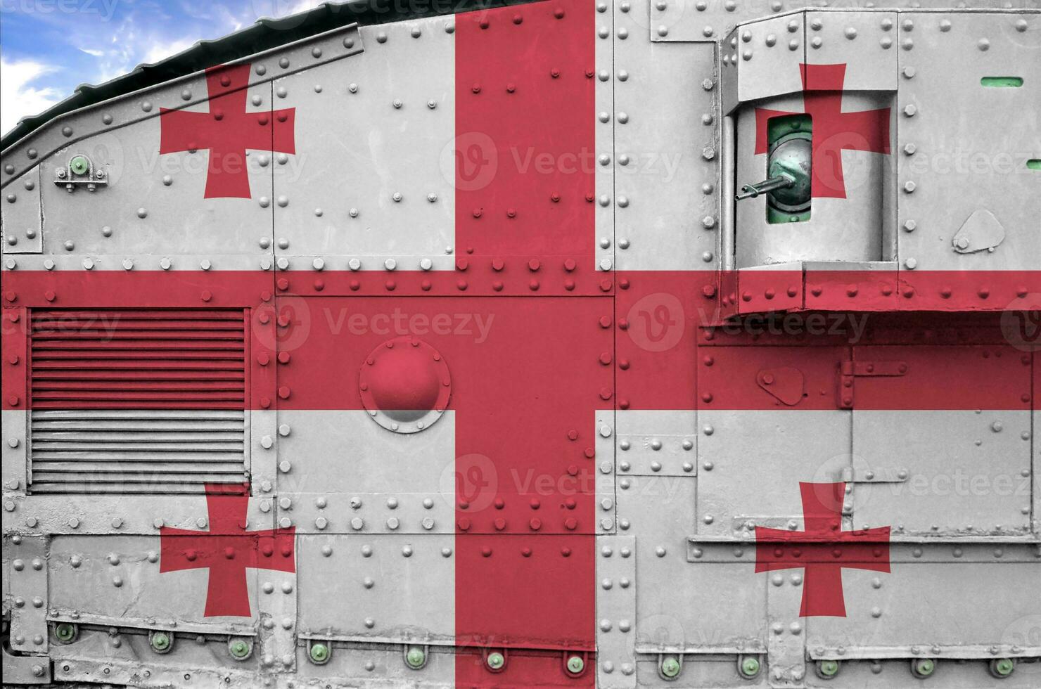 Georgia flag depicted on side part of military armored tank closeup. Army forces conceptual background photo