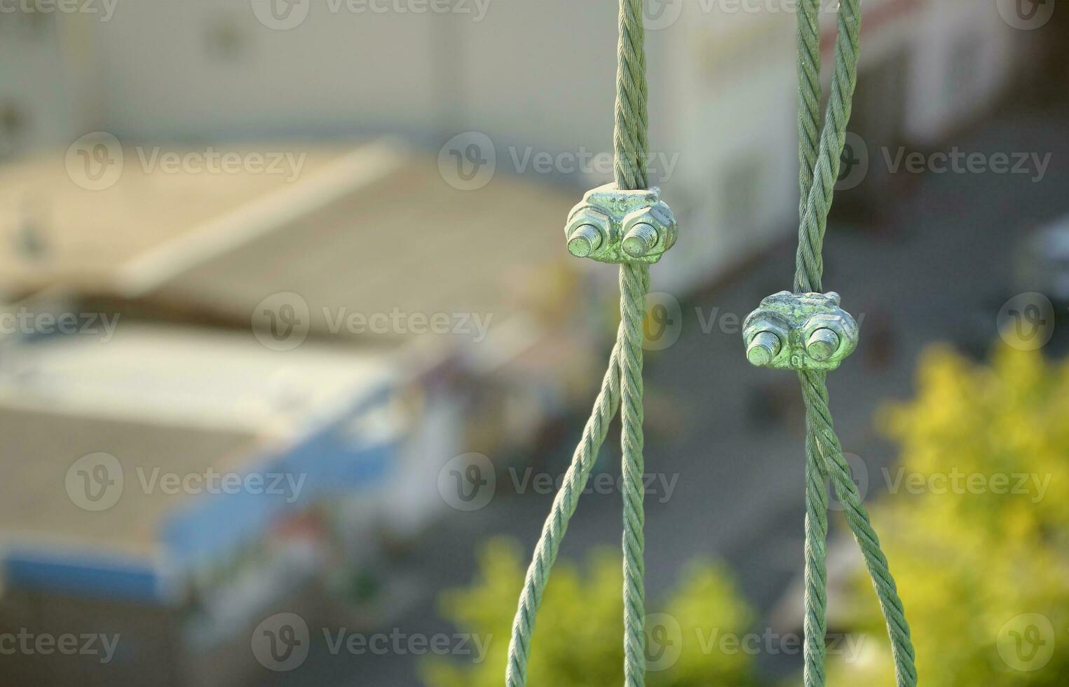 Rope lockers in of suspended wire rope platform for facade works on high multistorey buildings. Rope lockers blocks kink for safety platform usage photo
