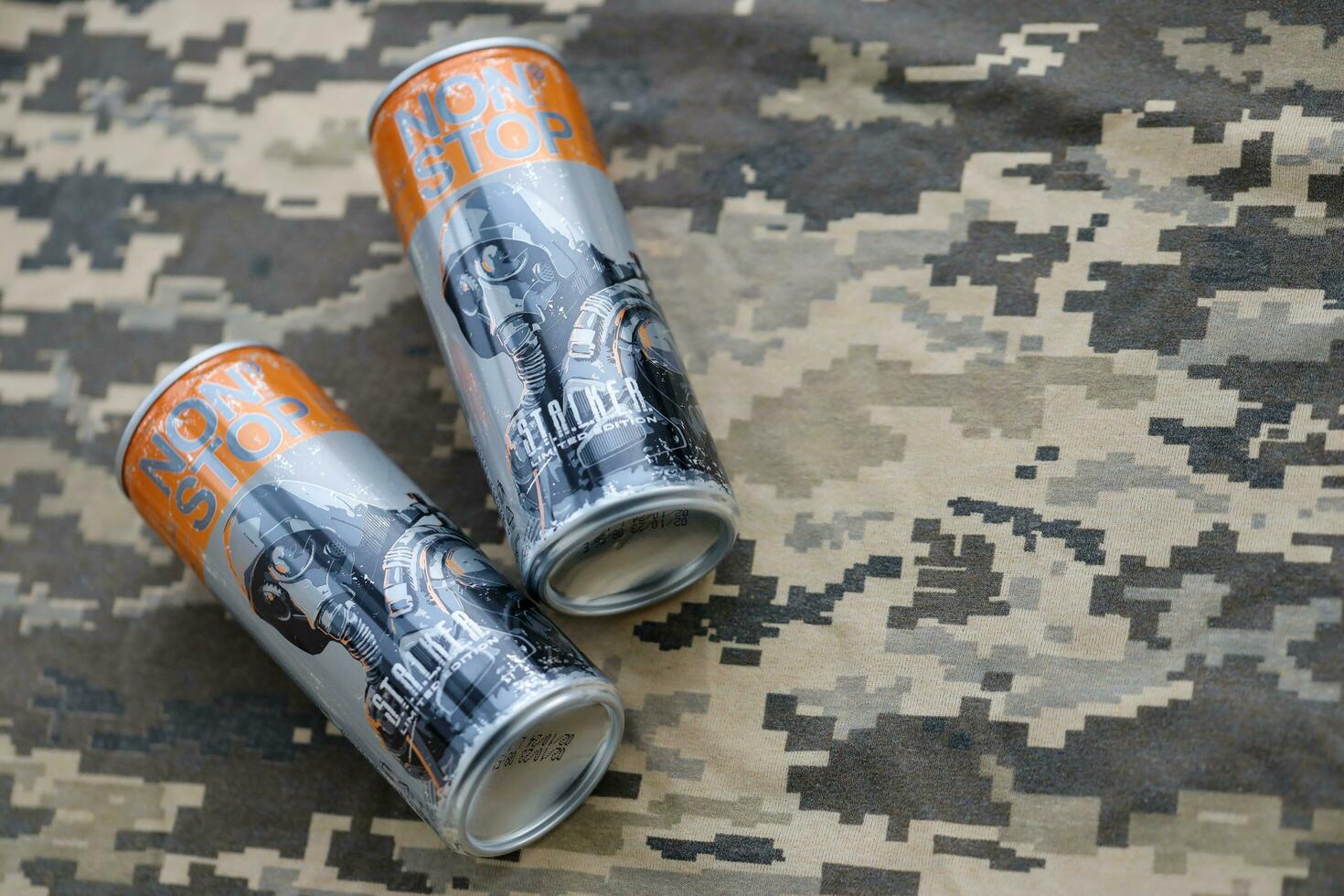 KYIV, UKRAINE - OCTOBER 31, 2023 Non Stop energy drink with limited edition design of Stalker and character with gas mask on aluminium tin can photo