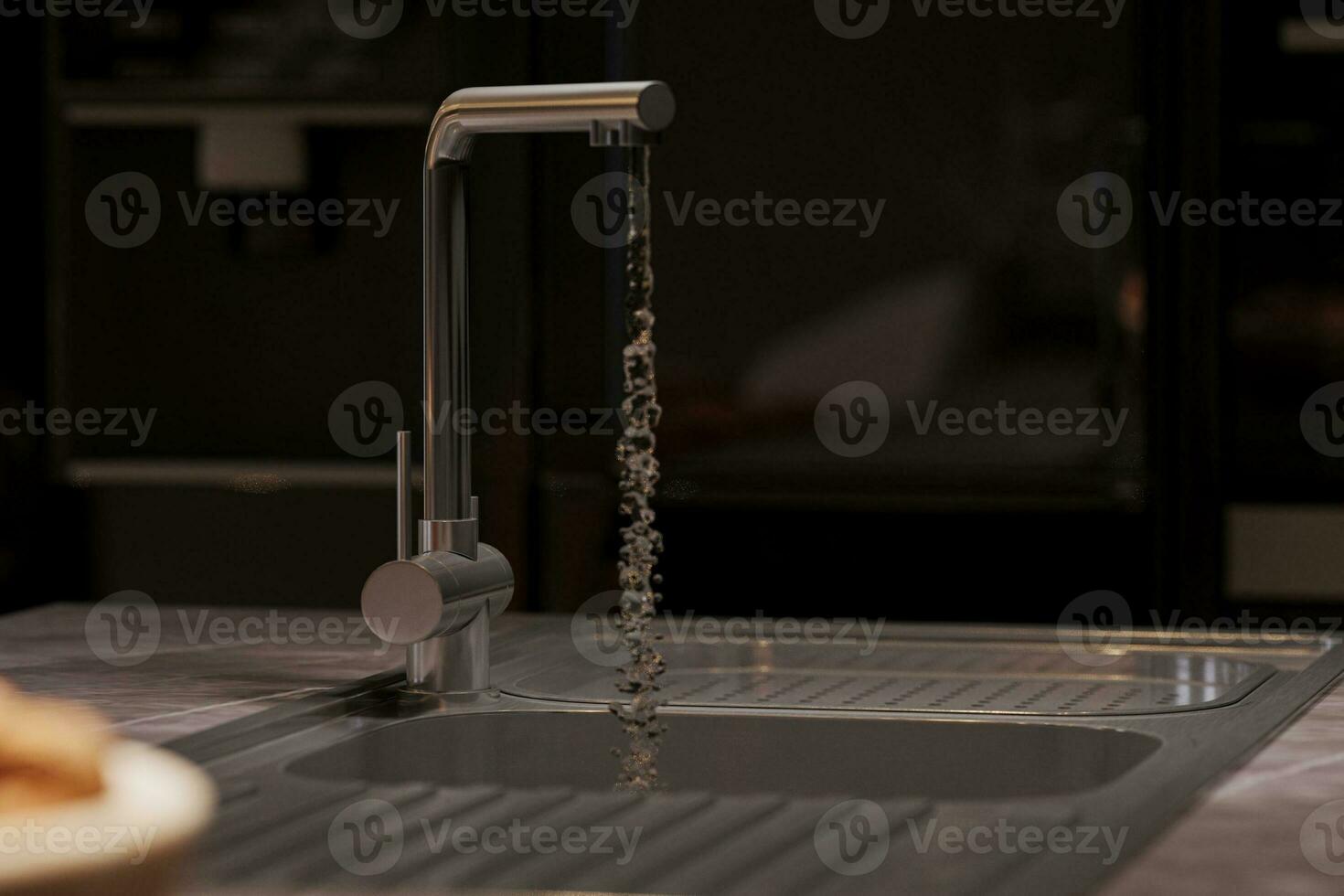 Water falls into the sink, 3d rendering of kitchen. photo