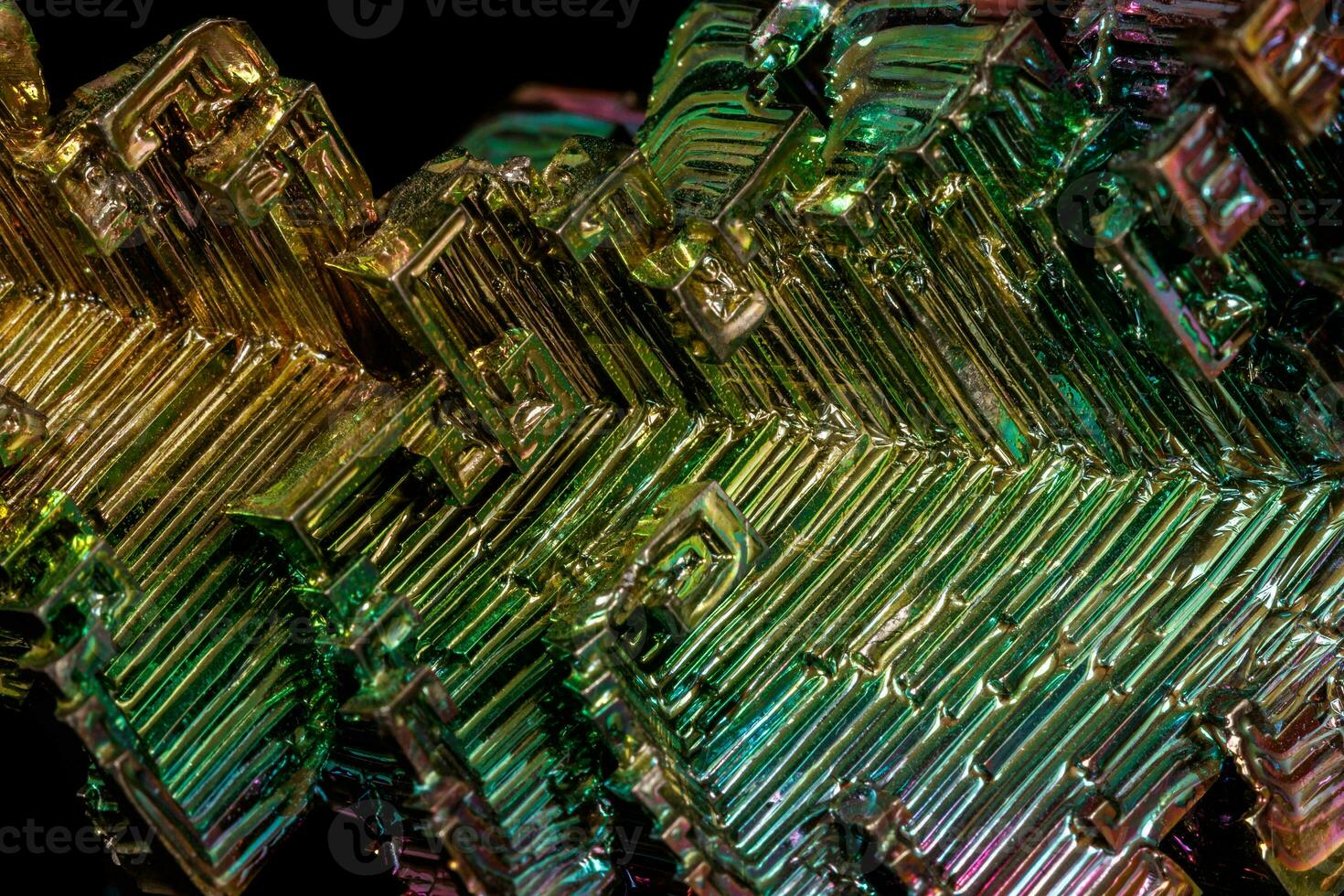 Macro of the stone bismuth mineral on a black background photo