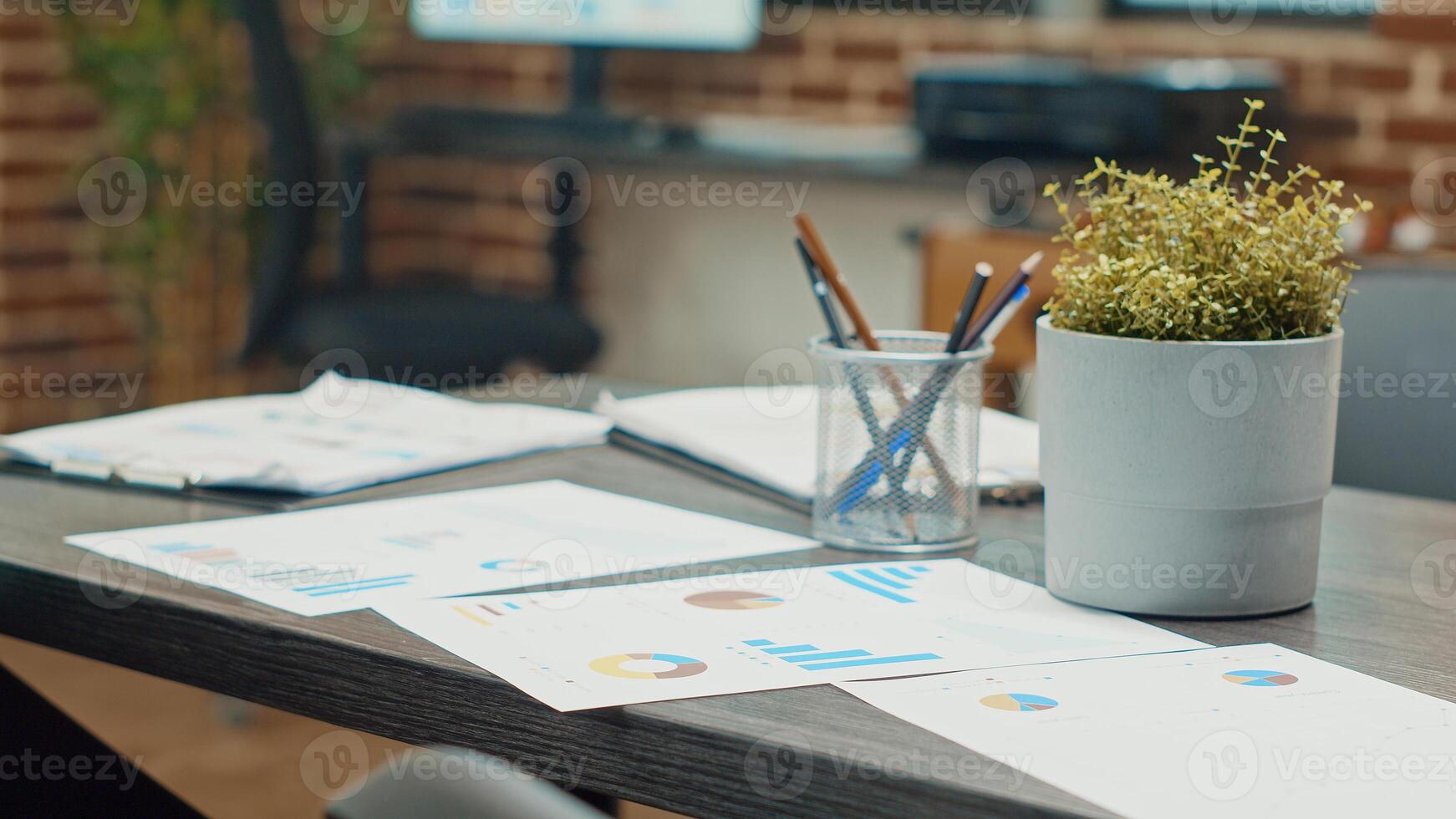 Official startup documents on table used for business analysis plan and global development, empty boardroom. Coworking space workstation filled with report files and corporate results. Close up. photo