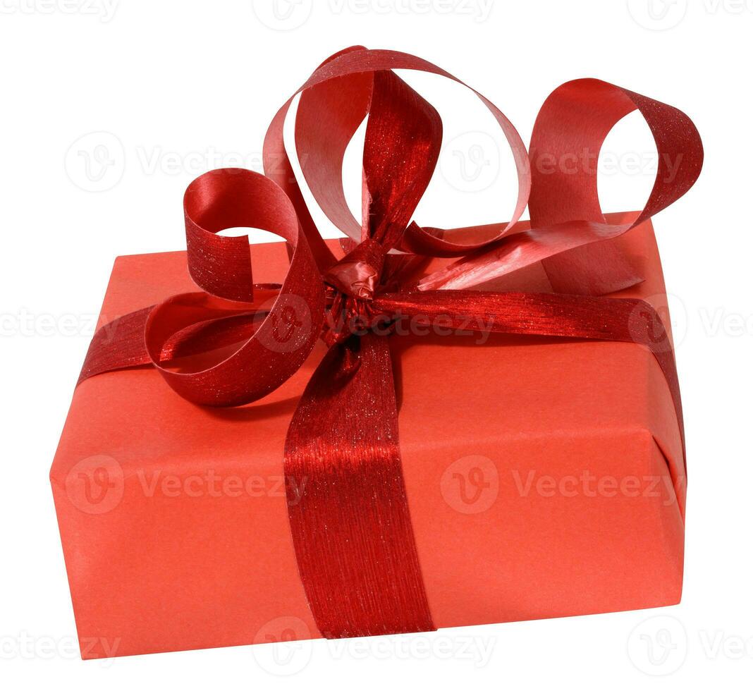 Box is wrapped in red gift wrapping paper and red ribbon photo