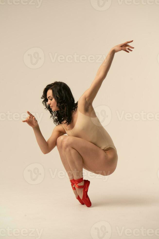 A woman jumping up in the air photo