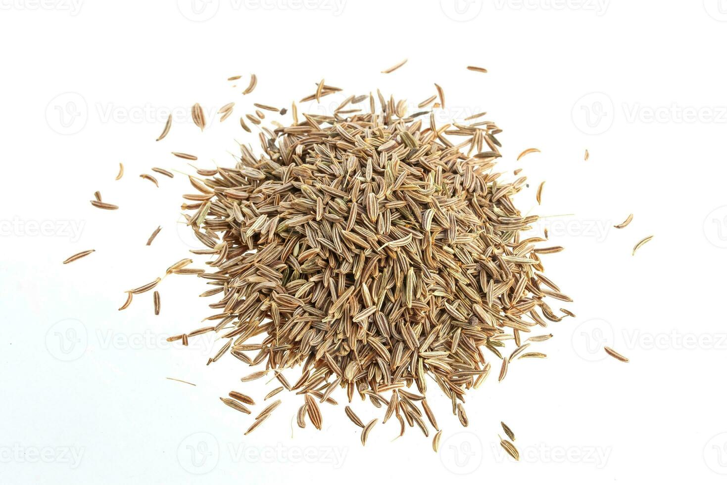 Pile of Cumin seeds isolated on white background photo