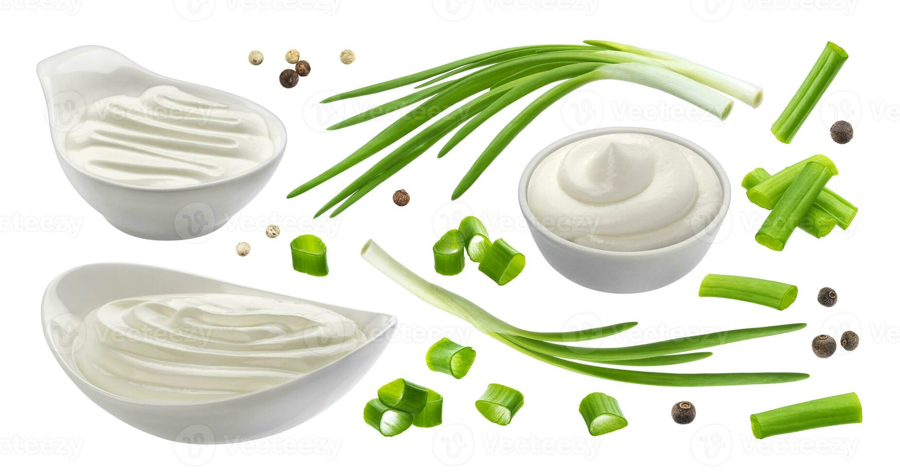 Sour cream and chives isolated on white background, green onion with sour cream sauce photo