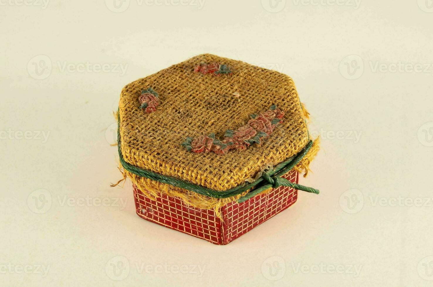 a small box with a small piece of fabric on it photo