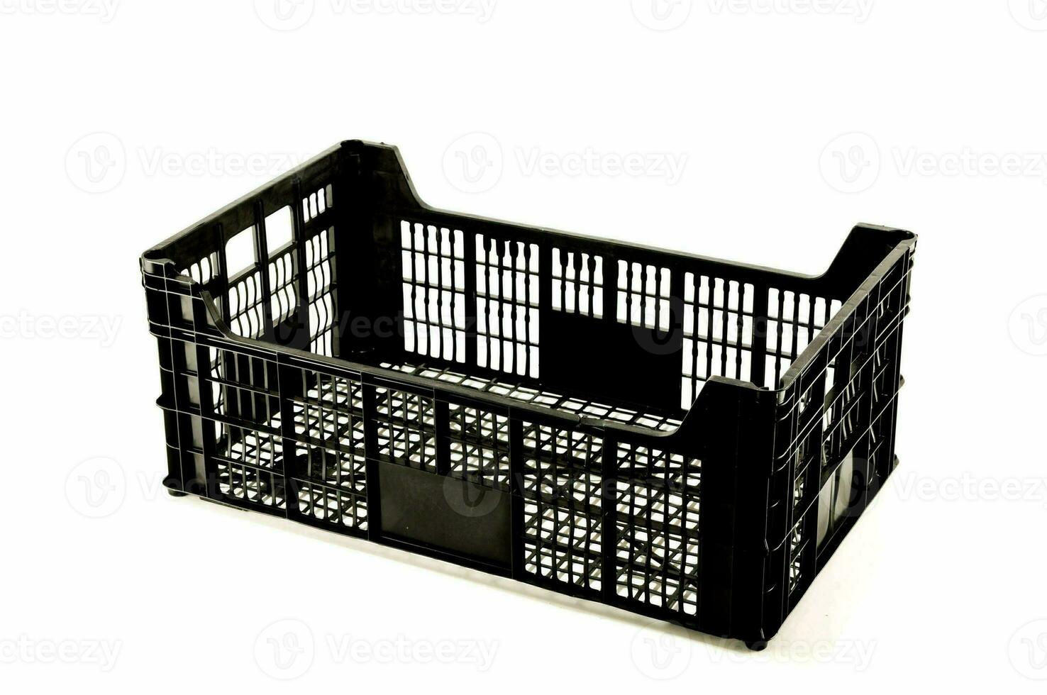 a black plastic crate on white photo