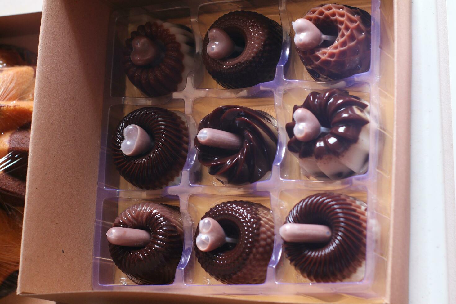 Milk chocolate pudding in a cardboard box photo