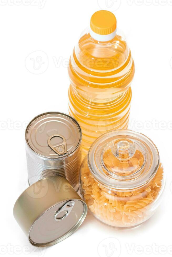 Food Reserves. Canned Food, Spaghetti, Pate, Tuna, Tomato Juice, Pasta, Fish and Grocery - Isolated on White Background. Emergency Food Storage in Case of Crisis. Strategic Food Supplies - Isolation photo