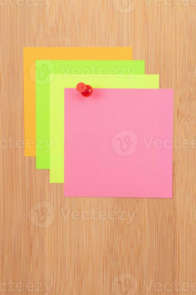 Colored Sticky Notes with Copyspace Pinned to the Wooden Message Board. To Do List Reminder in Office. Blank Memo Sticker at Work Template. Empty Checklist Mockup photo