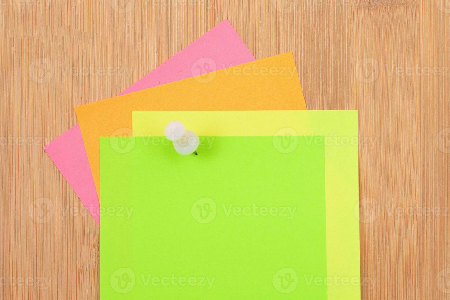 Colored Sticky Notes with Copyspace Pinned to the Wooden Message Board. To Do List Reminder in Office. Blank Memo Sticker at Work Template. Empty Checklist Mockup photo