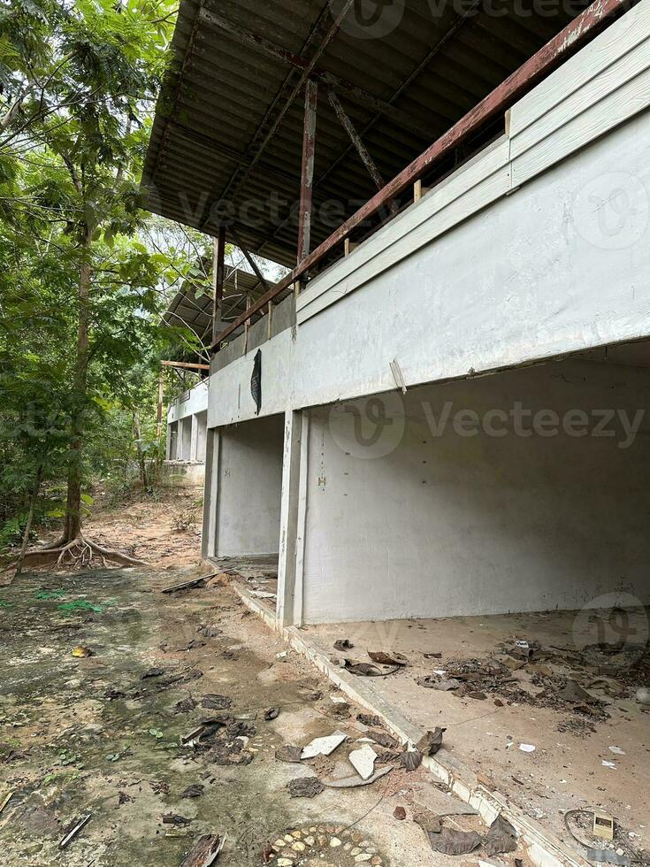 abandoned building in the forest photo