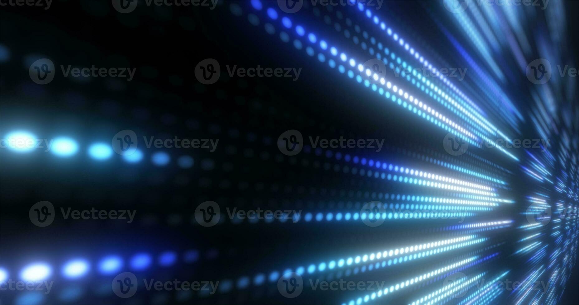 Abstract bright blue background pattern of flying circles of dots and glowing futuristic digital energy magical bright particles photo