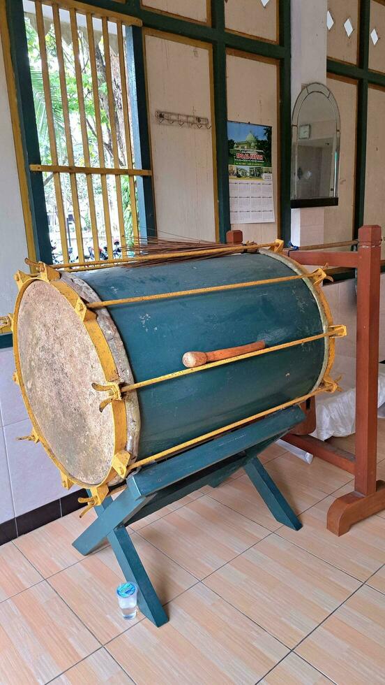 drum and beater in the mosque, suitable for advertising Ramadan and traditional musical instruments photo