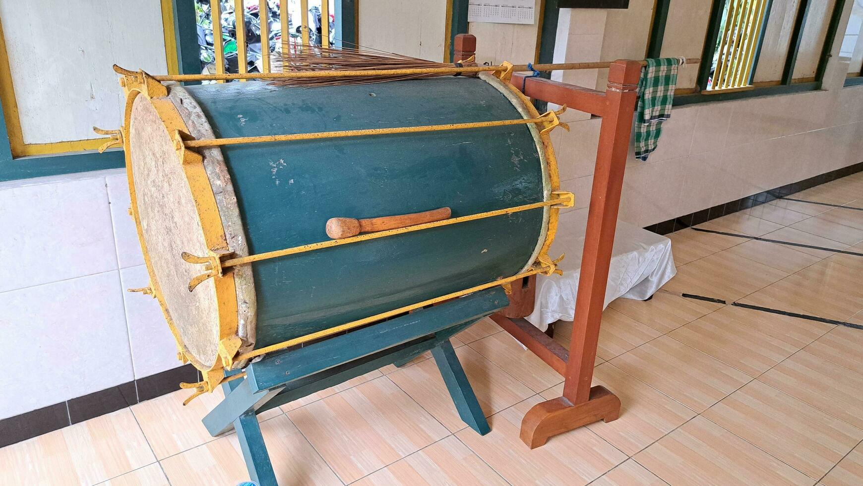 drum and beater in the mosque, suitable for advertising Ramadan and traditional musical instruments photo