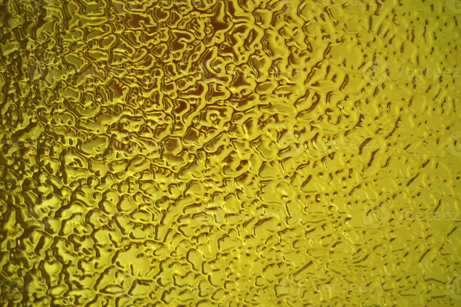 Green glass with a pattern. Stained glass pattern. photo