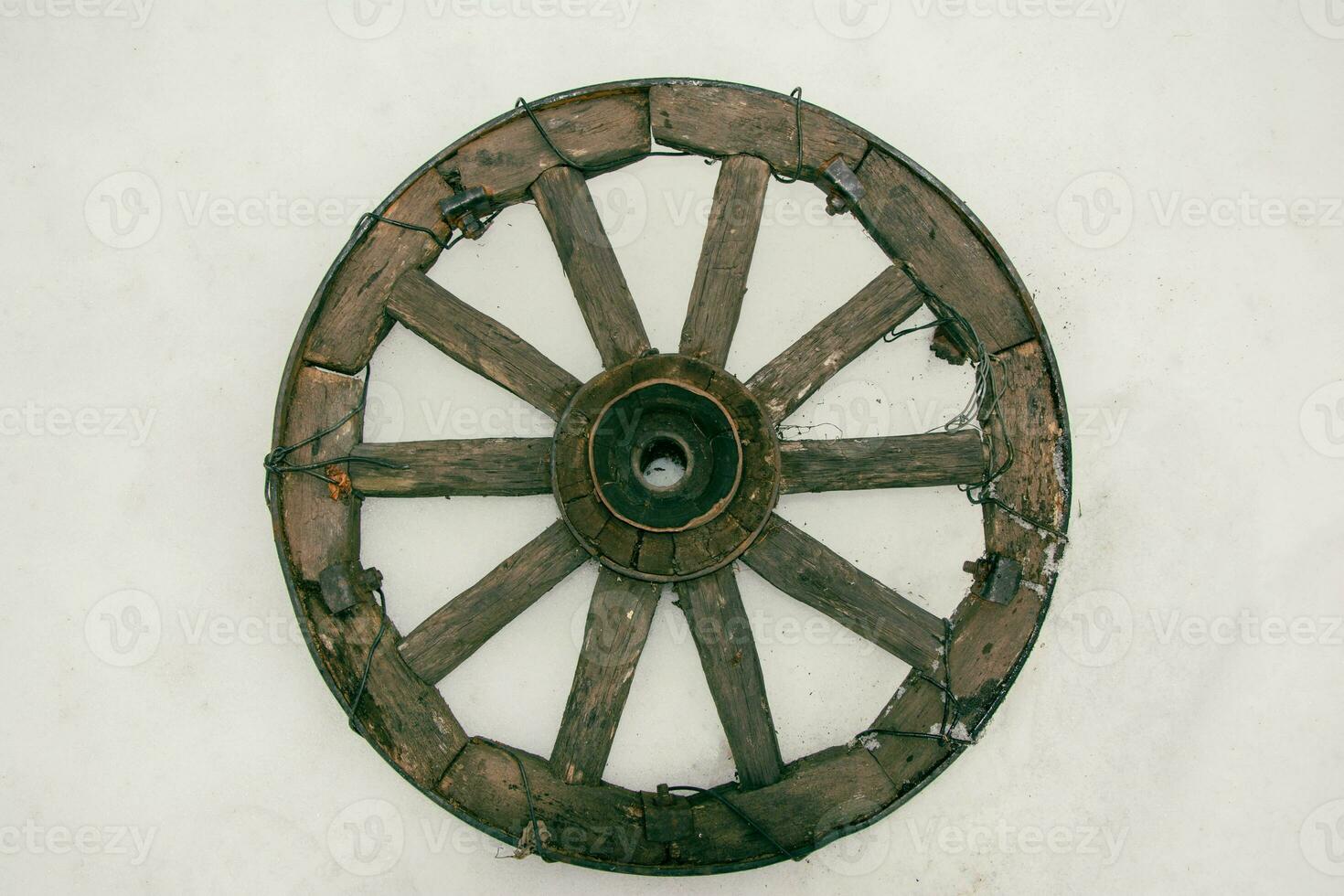 Vintage Wooden Wheel from an Old Cart, Rustic Country Decor Element photo