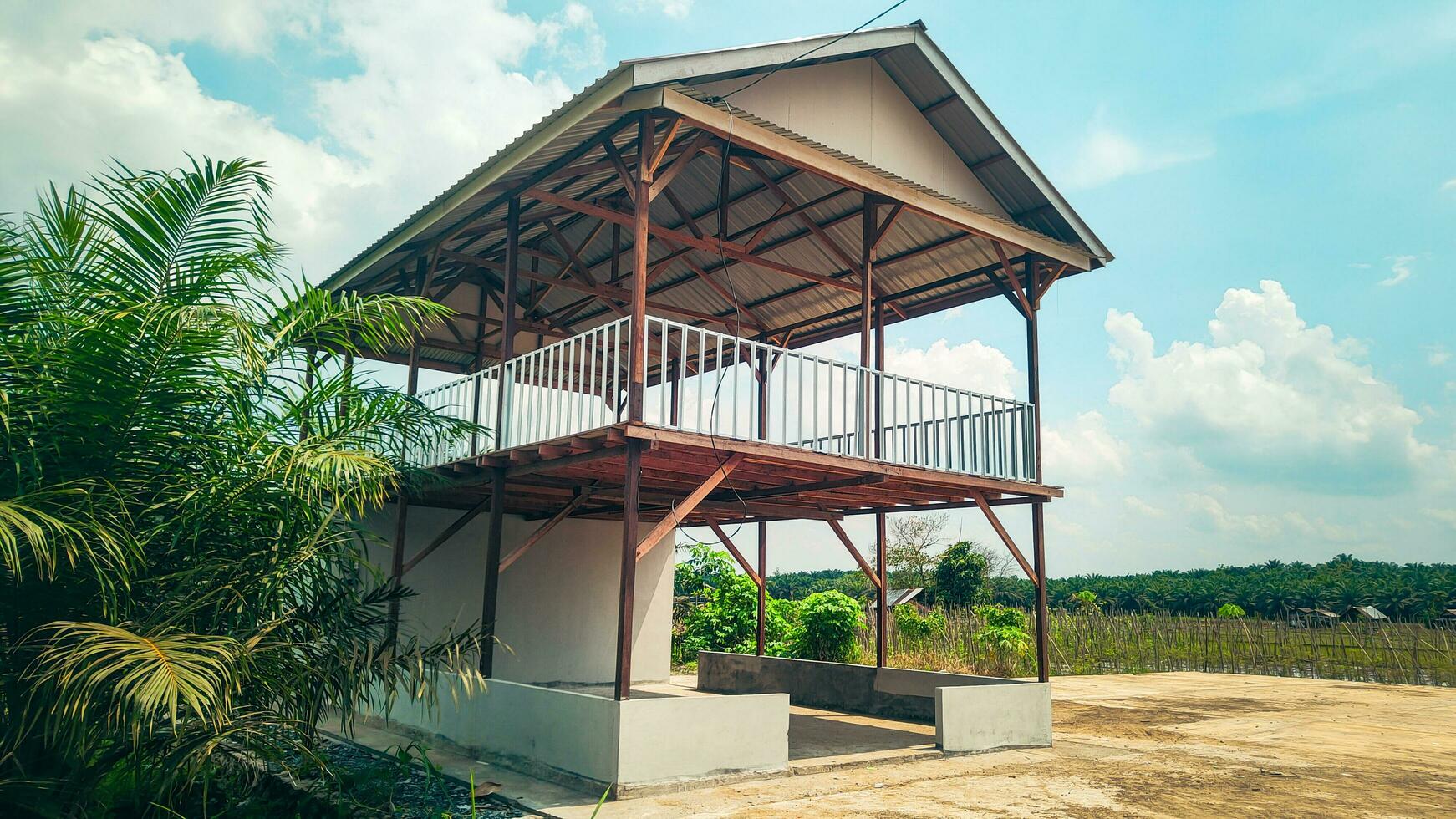 This farmer's hall presents a two-story concept that is functional and environmentally friendly. The first floor is the center of agricultural activities photo