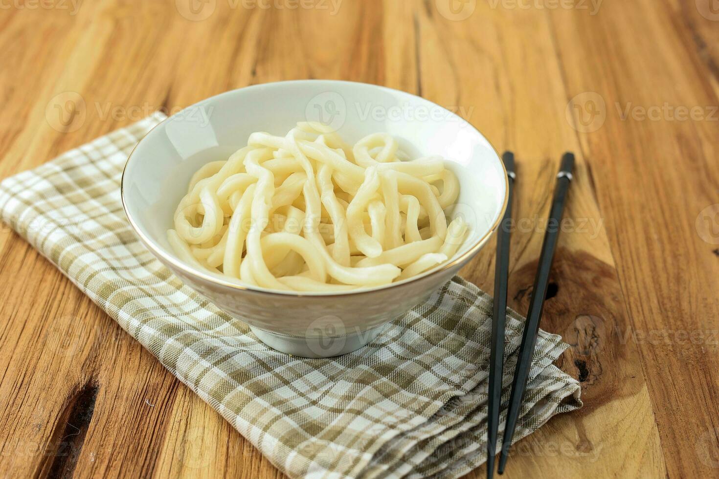 Japanese Udon Noodles on White Bowl photo