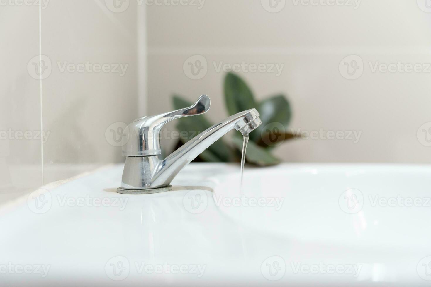 Save water. turning off the running water in the bathroom to protect environment. Greening planet, reduce global warming, Save world, life, future, risk energy, crisis , water day. photo