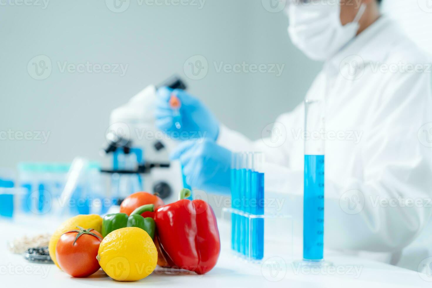 Scientist check chemical food residues in laboratory. Control experts inspect quality of fruits, vegetables. lab, hazards, ROHs, find prohibited substances, contaminate, Microscope, Microbiologist photo