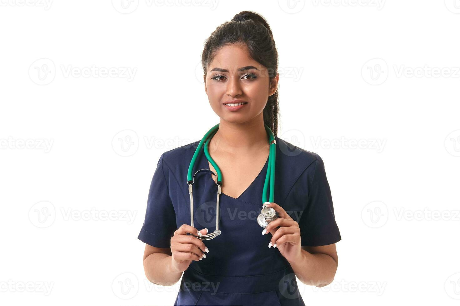 Beautiful young doctor with a stethoscope, isolated on white photo