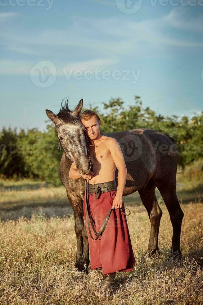 cosaco y su caballo. Ucrania. zaporozhye seg. foto