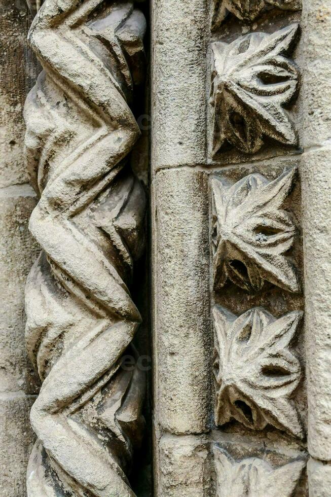 detail of a carved stone archway photo