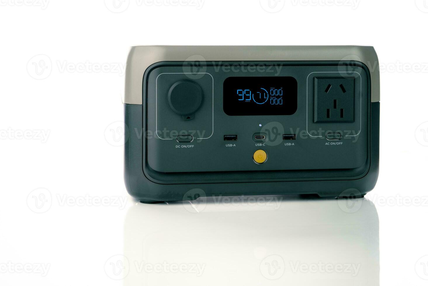 Portable power station or power box isolated on white background. On-the-Go energy solution. Power supply for outdoor adventure. Compact portable power box with a rechargeable lithium-ion battery. photo