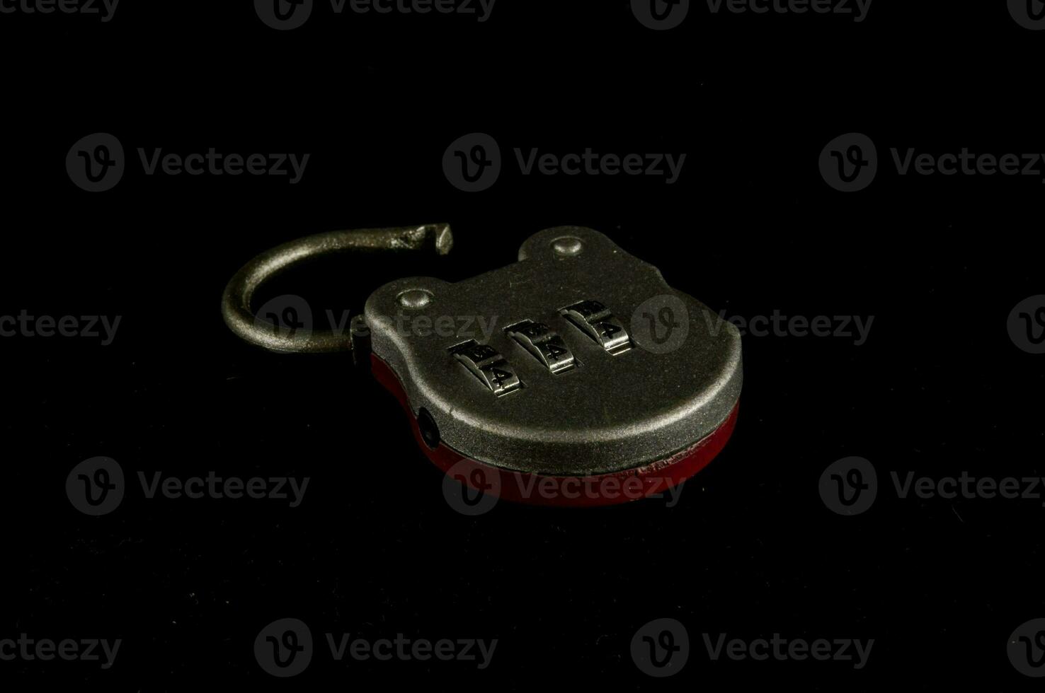 a metal lock with a combination on a black background photo