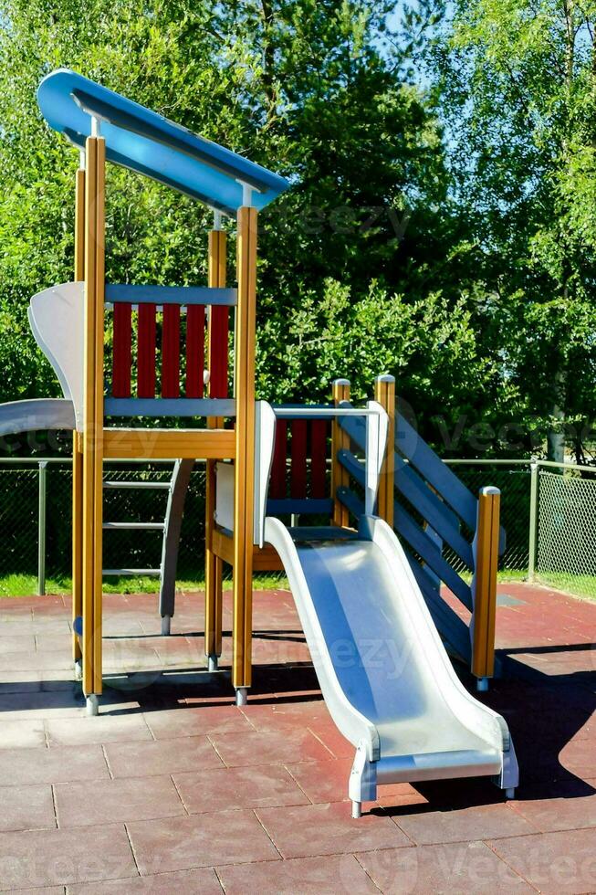 a playground with a slide photo