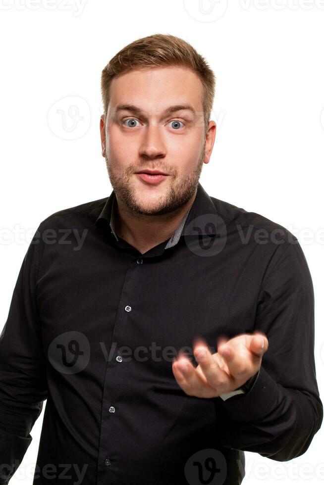 Bearded man smiling and spreading hands don't know what to say in answer. Body language. photo