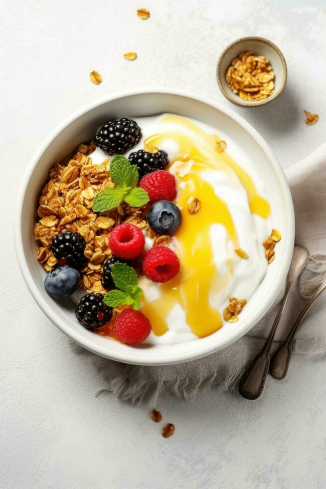 AI generated A bowl of Greek yogurt topped with granola, mixed berries, and a drizzle of honey photo