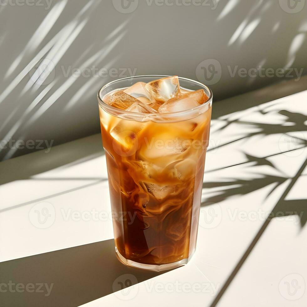 AI generated Iced coffee drink in a crystal glass on the white table in natural light, long shadows, minimalist photo