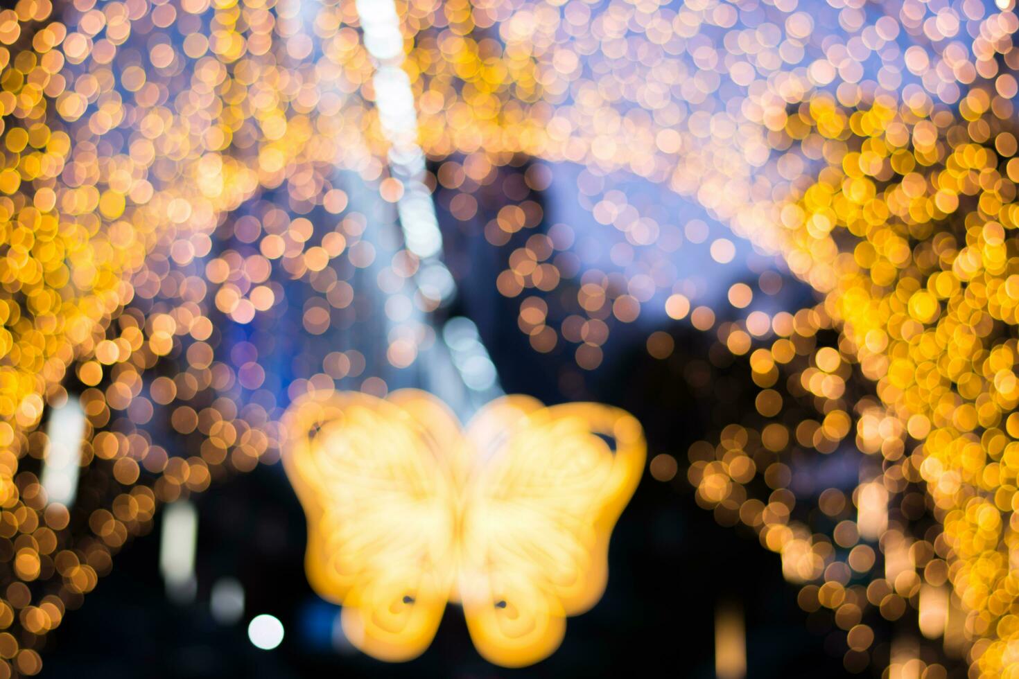 Abstract blure Bokeh lights and background decored in butterfly shape photo