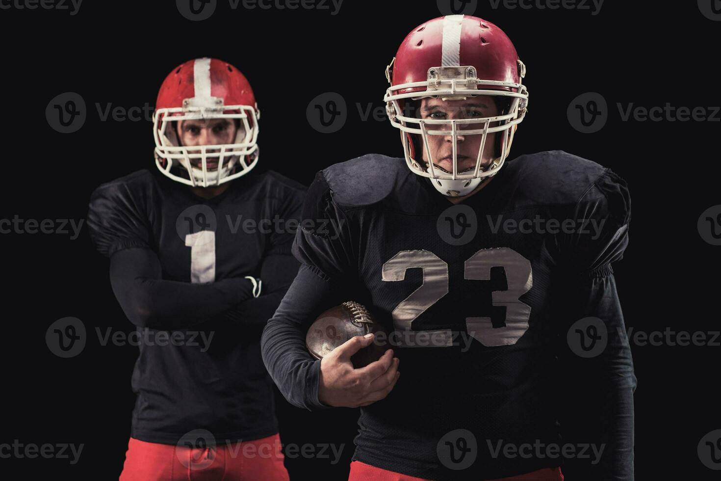 Football player on dark background photo