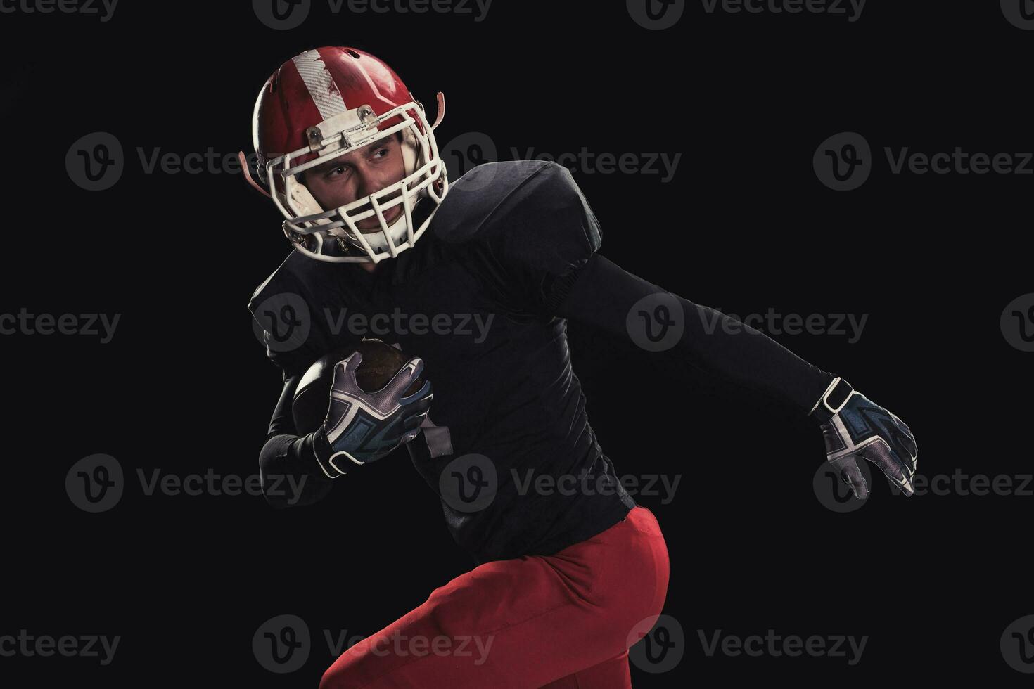 Football player on dark background photo