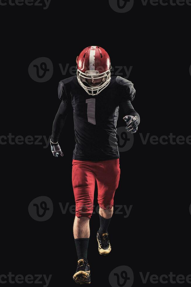 Football player on dark background photo