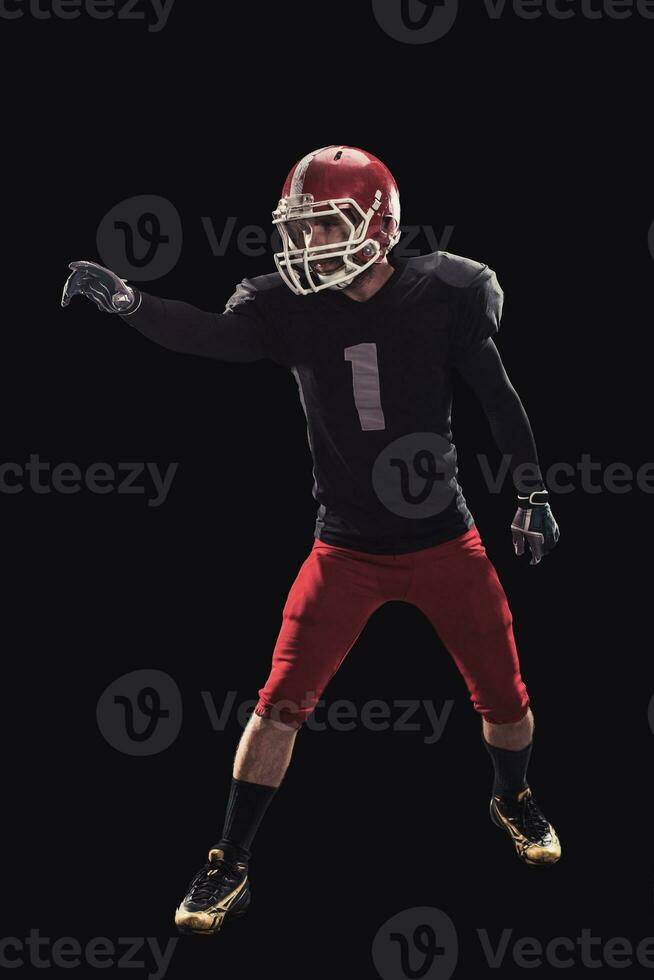 Football player on dark background photo