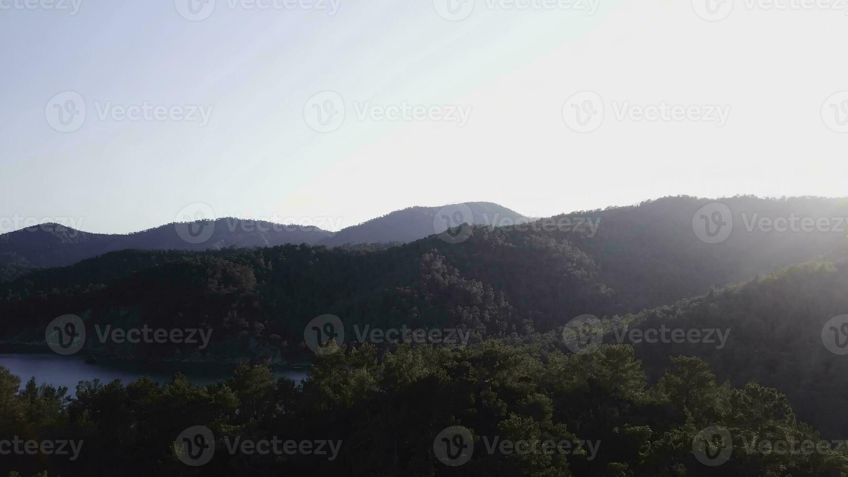 Beautiful landscape nature of rainforest and mountain background. Top view of tropical mountains on a Sunny day photo