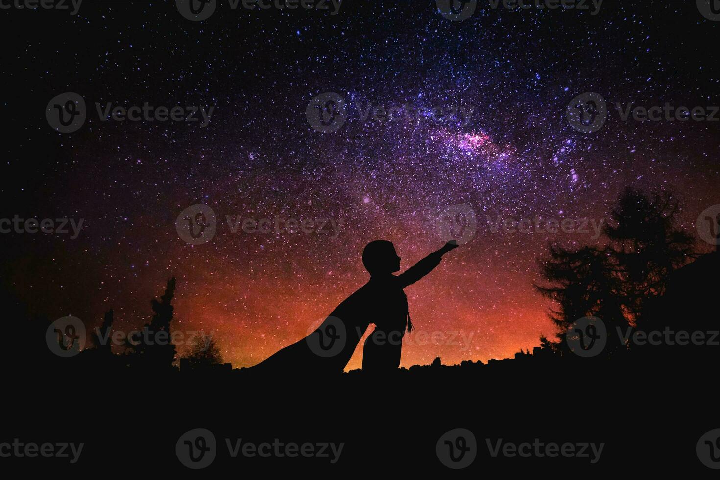superhero at the night starry sky background. Mixed media photo