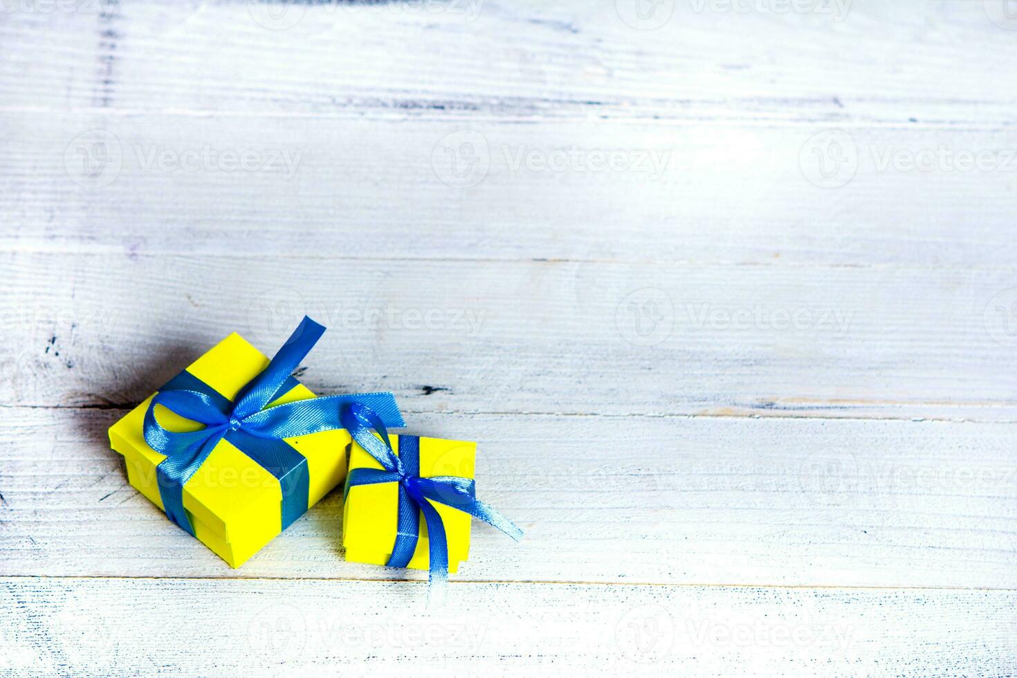 Gift boxes on wooden table. Collection of gift boxes on wooden board holidays concept. Presents for any holiday concept photo