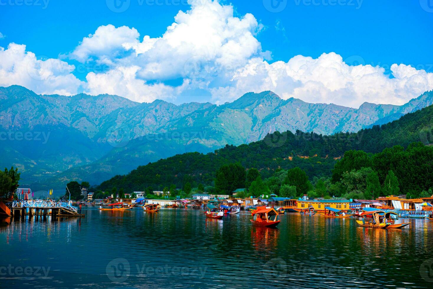 Dal Lake , and the beautiful mountain range in the background in the city of Srinagar, Kashmir, India. photo