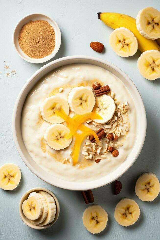 AI generated A bowl of creamy oatmeal with sliced banana, honey, and chopped walnuts photo