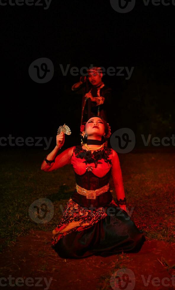 a female dancer looks lost and reflects the emptiness and loss photo