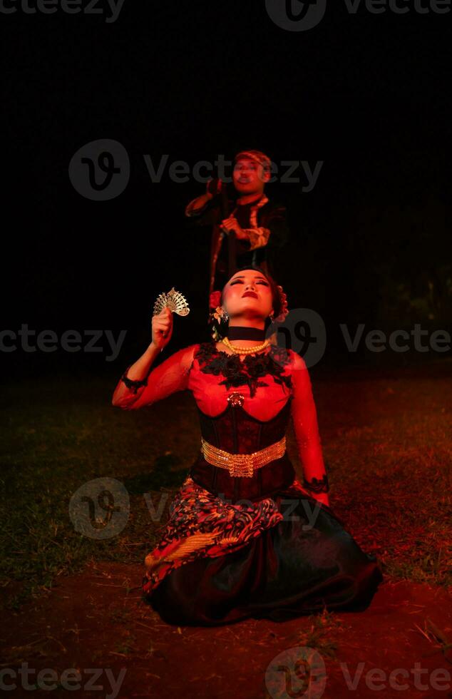 a female dancer looks lost and reflects the emptiness and loss photo